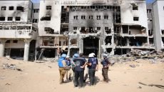 A United Nations (UN) team inspects the grounds of Al-Shifa hospital, Gaza's largest hospital, which was reduced to ashes by a two-week Israeli raid, on April 8, 2024, amid the ongoing conflict between Israel and the Palestinian Hamas militant group. (Photo by AFP) (Photo by -/AFP via Getty Images)