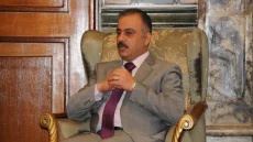 سقوط “جمهورية السكراب”: كيف فككت عائلة الكربولي الصناعة العراقية وحولتها إلى إقطاعية سوداء لغسيل المليارات؟